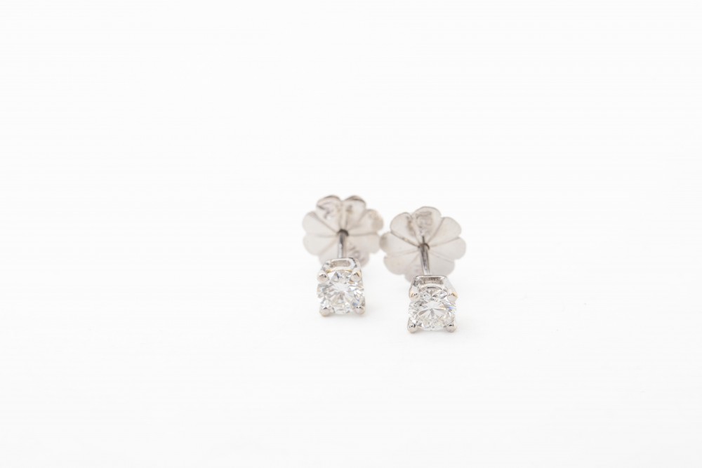 Aretes solitario con diamantes de 0.25Ct