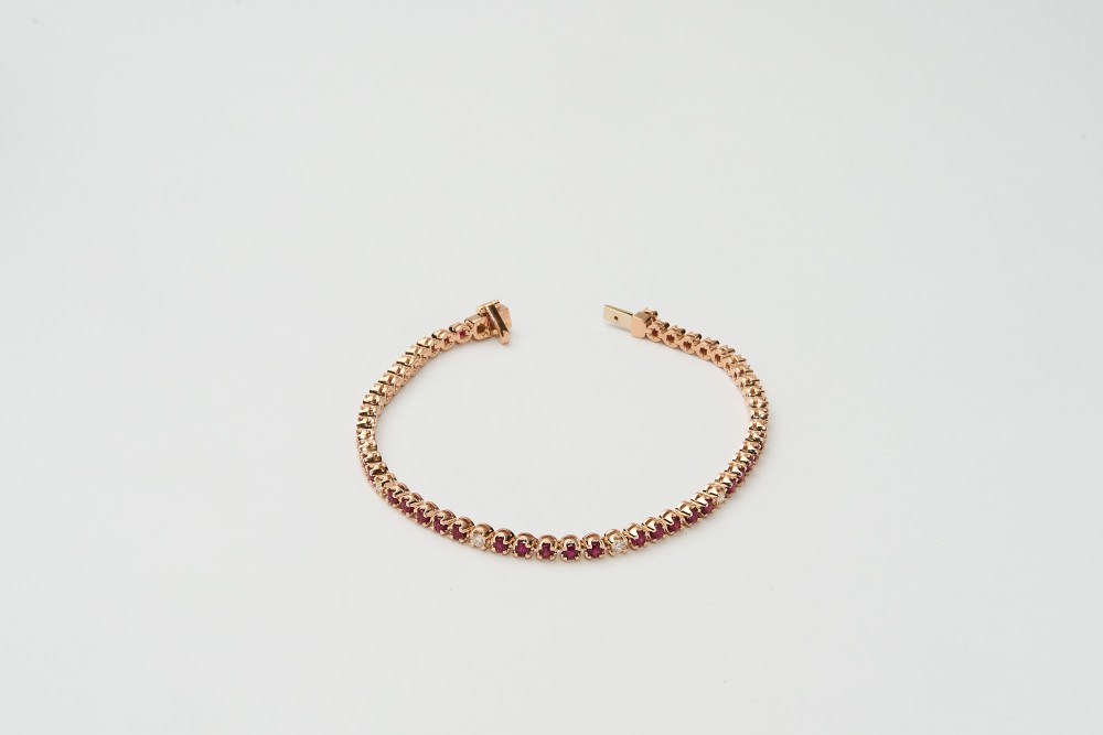 Pulsera tennis con rubís y diamantes