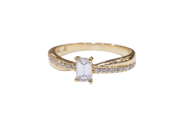 Anillo de compromiso con baguette central 0.30ct
