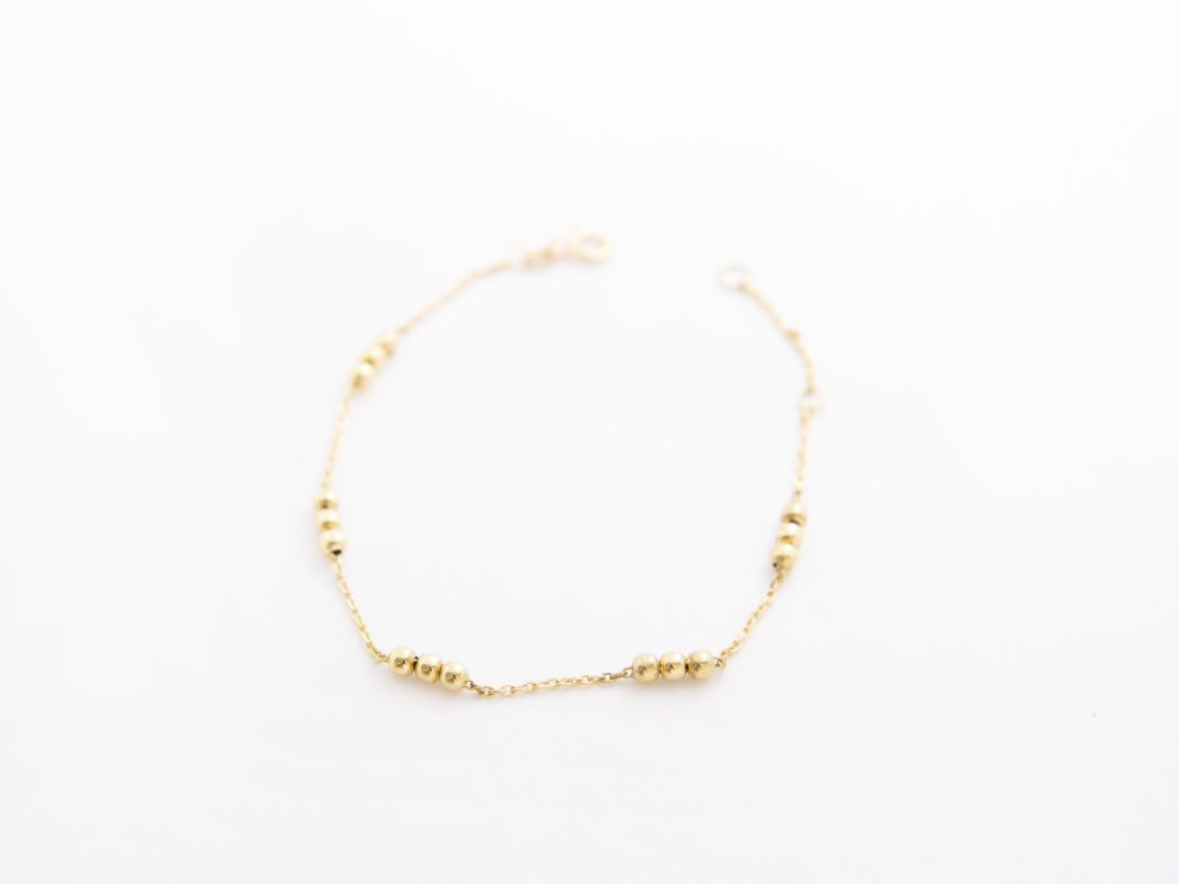 Pulsera bolitas en oro amarillo