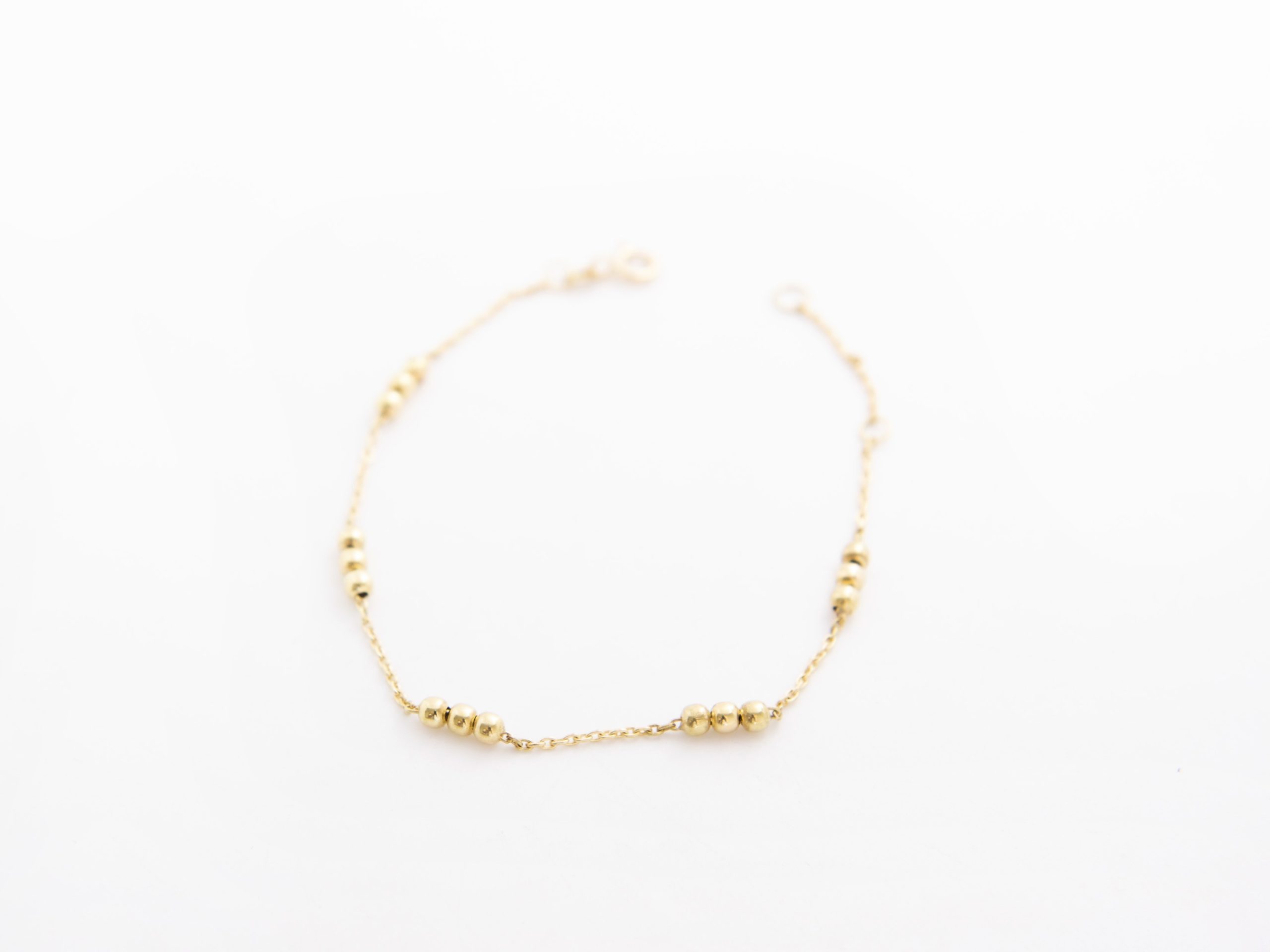 Pulsera bolitas en oro amarillo