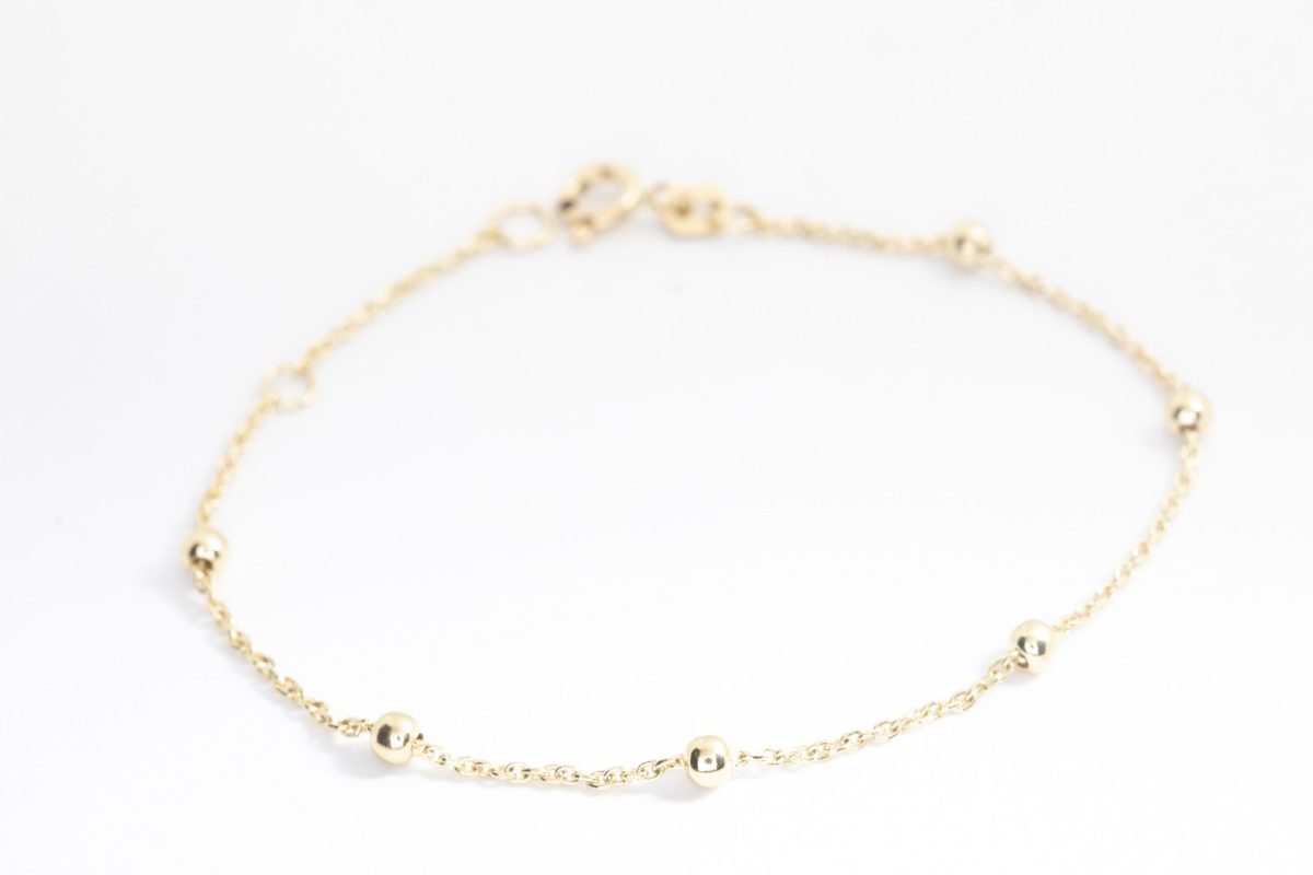 Pulsera de oro con bolitas