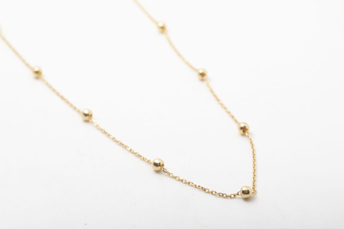 Collar bolitas en oro amarillo