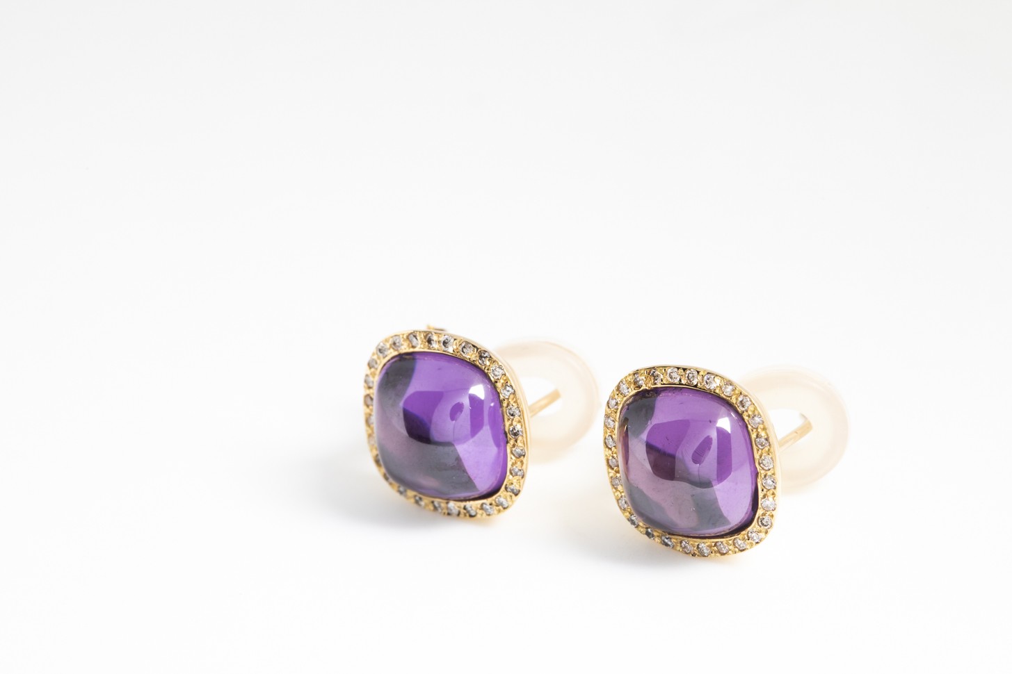 Aretes con amatistas reconstituidas en oro amarillo