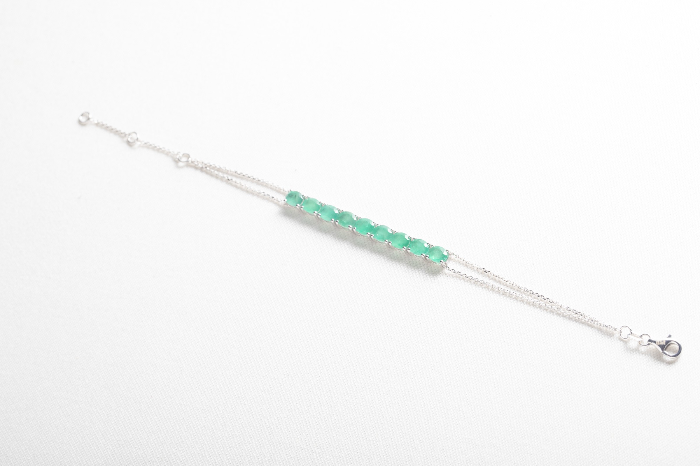 Pulsera en oro blanco con Esmeraldas