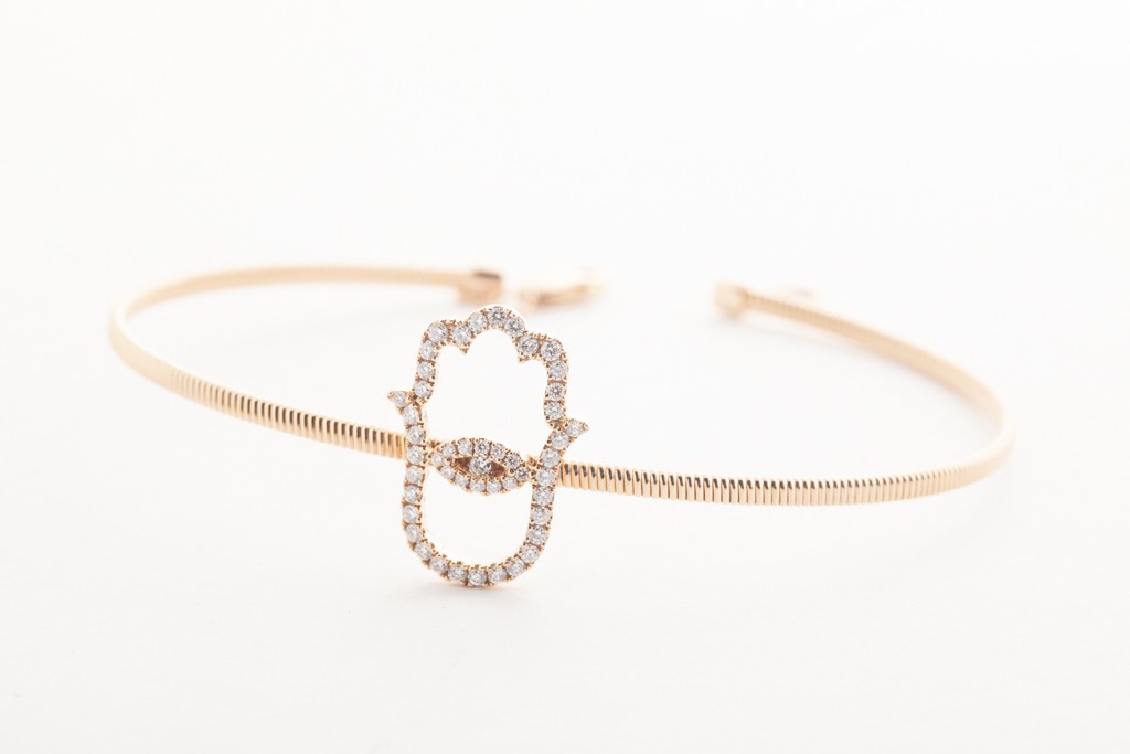 Pulsera mano con ojo de oro rosado con diamantes